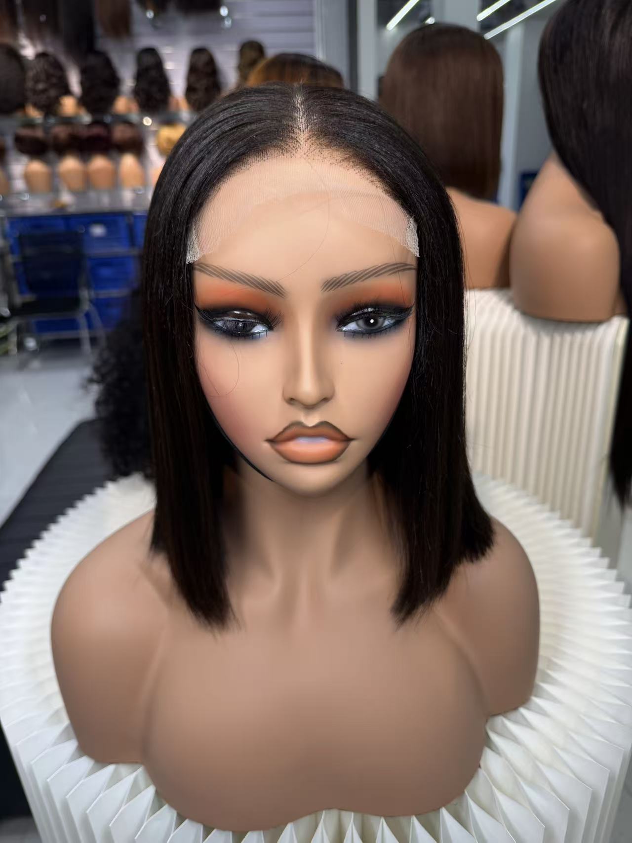 Perruques en cheveux humains naturels bouclés bruts vierges en gros 180%
